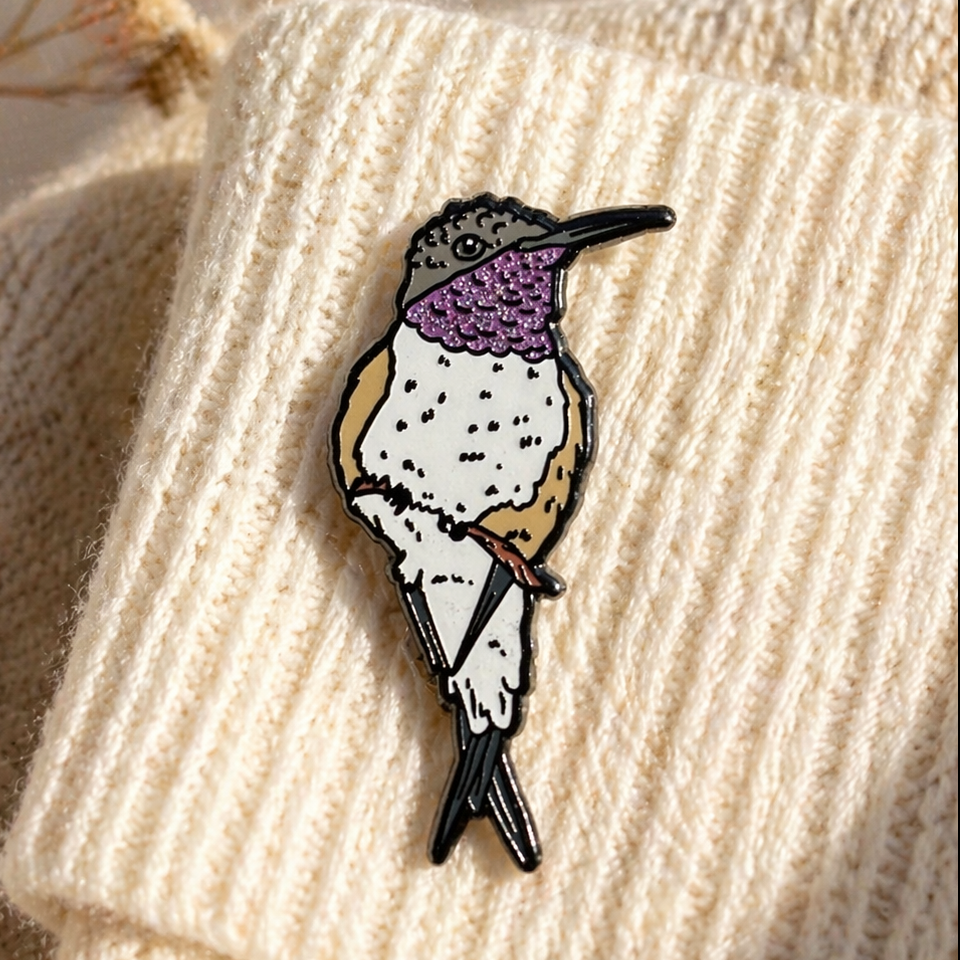 Chilean Woodstar glitter enamel pin by Anthony Lujan