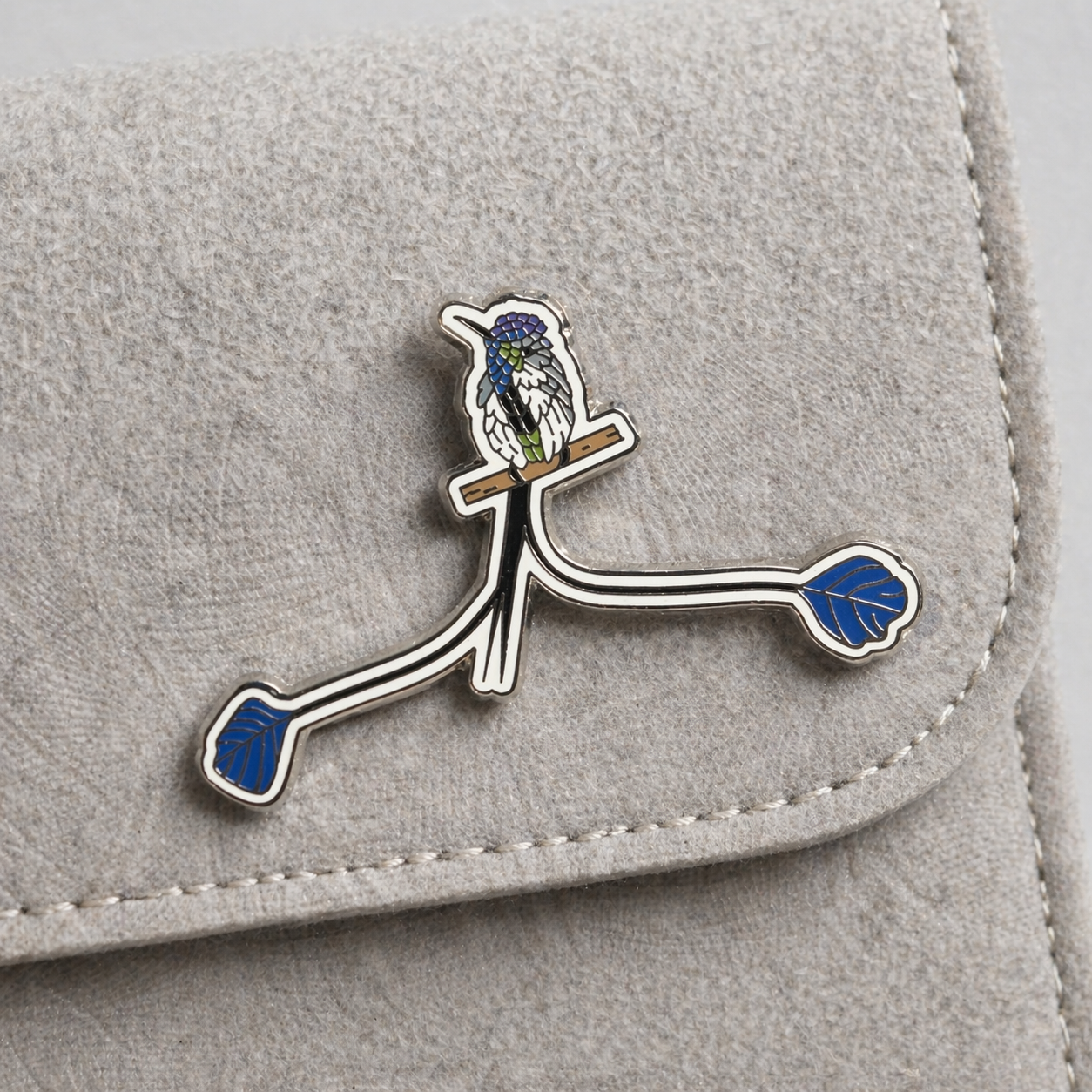Marvelous Spatuletail enamel pin by Anthony Lujan